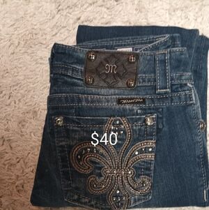 Very Cute Woman's Miss Me Blue Jeans with Silver Accents